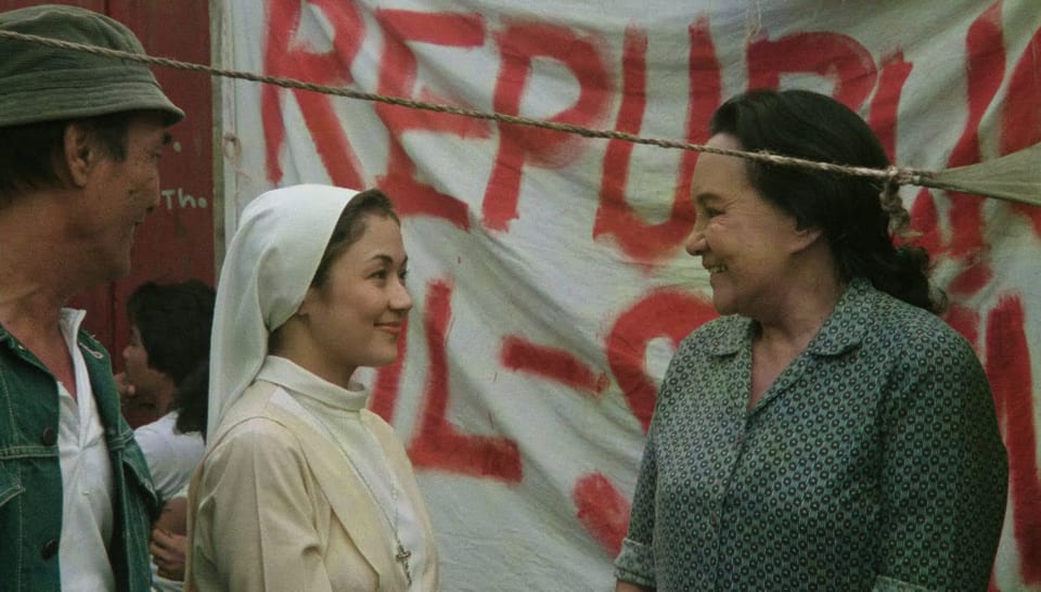 Vilma Santos in nun costume smiles at Anita Linda in Sister Stella L